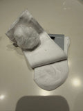 Kniekousjes met pompon Wit